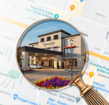 Varenita of Simi Valley Exterior in magnifying glass over maps 