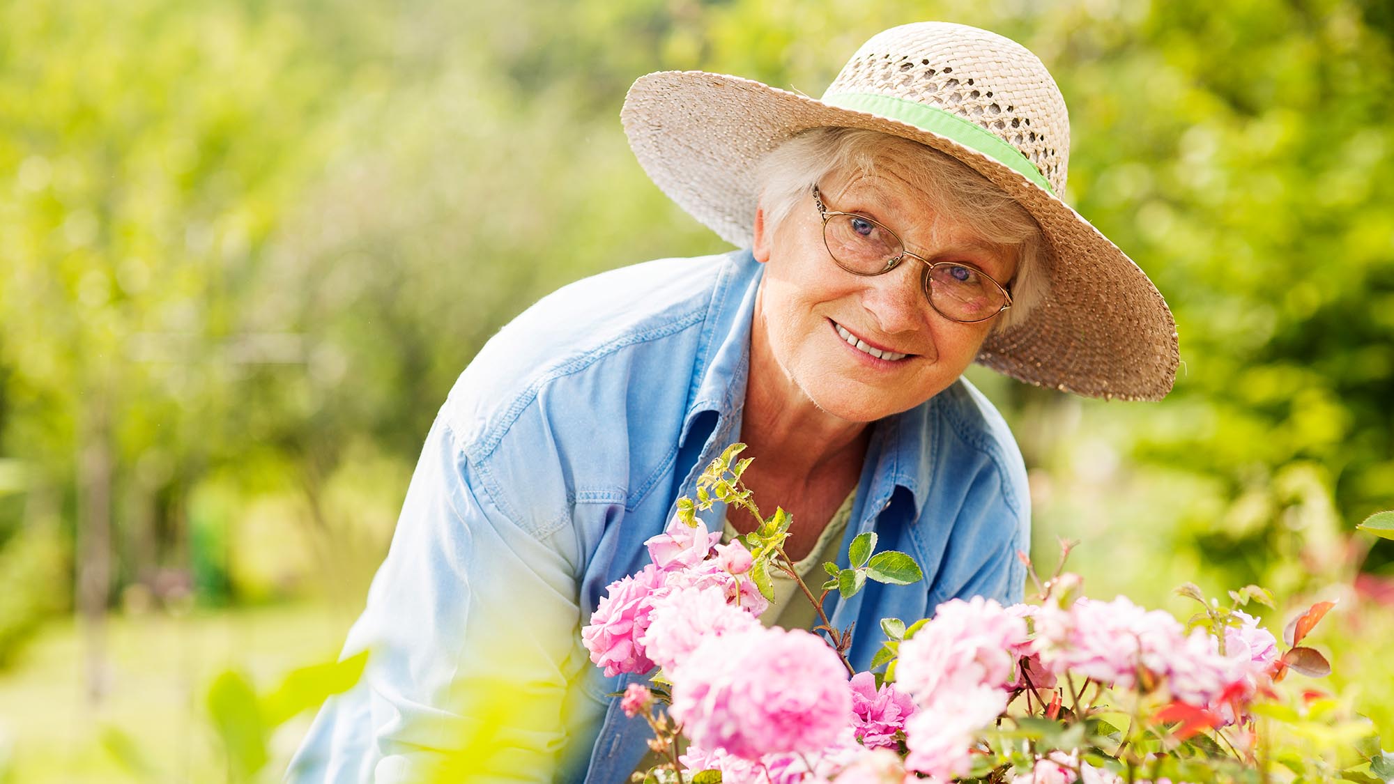 elderly woman gardening in assisted living community in Acworth Georgia