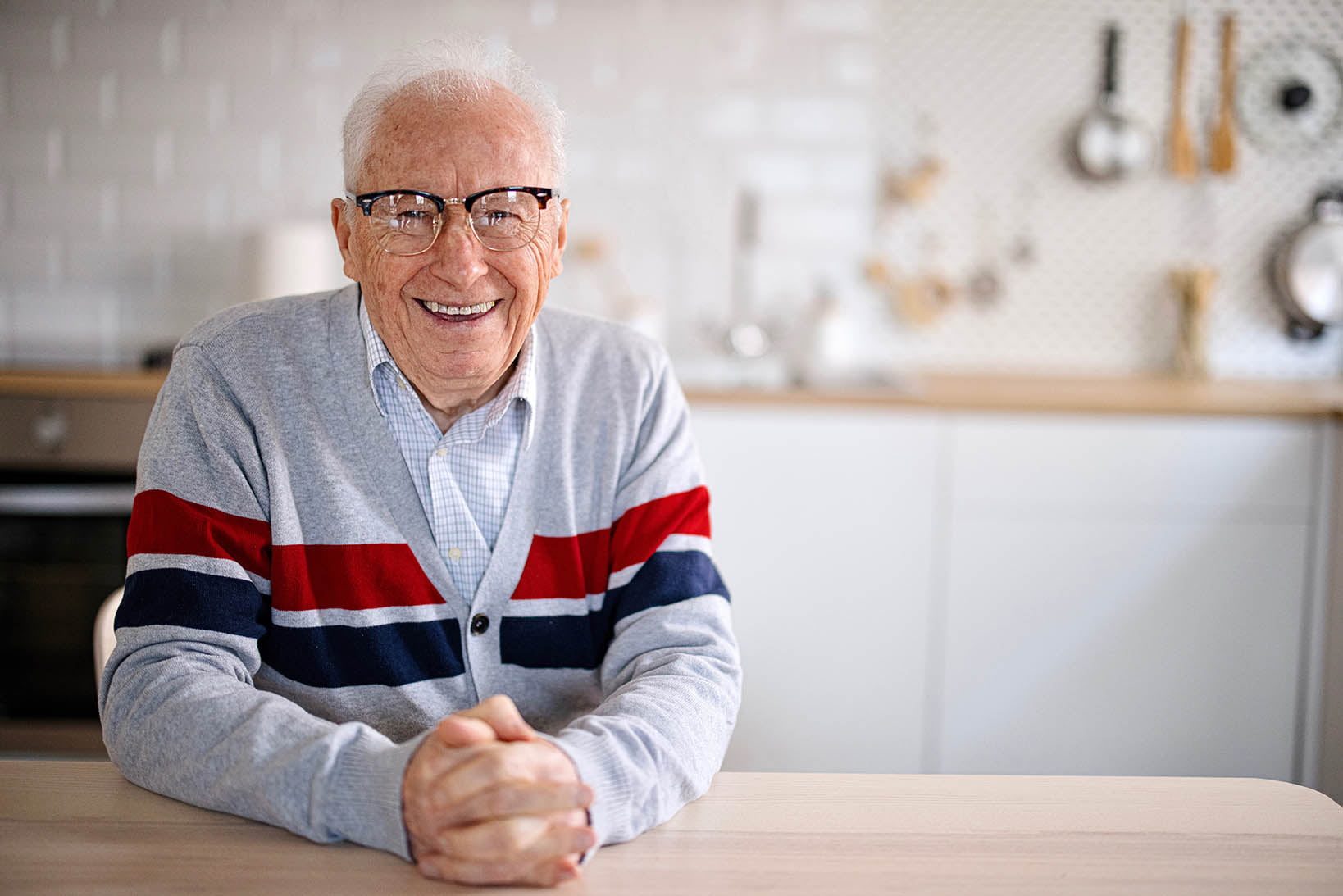 Portrait of happy smiling senior at home