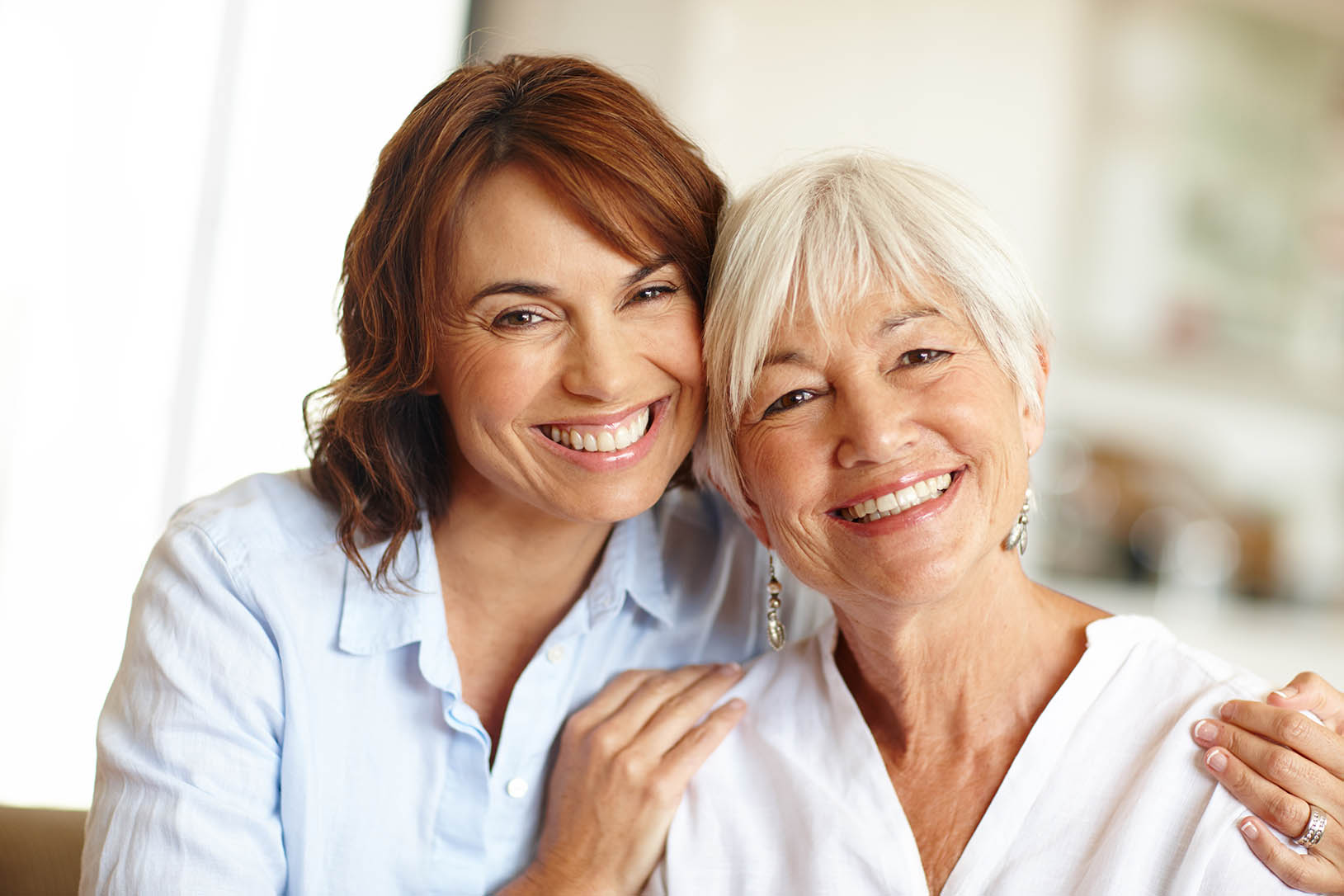 Portrait of a woman spending time with her elderly mother